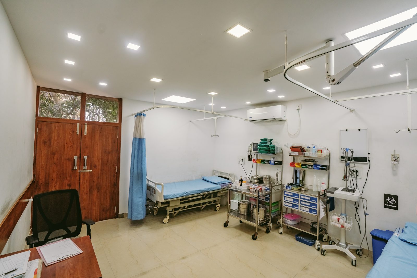 Procedure room with examination bed and equipment