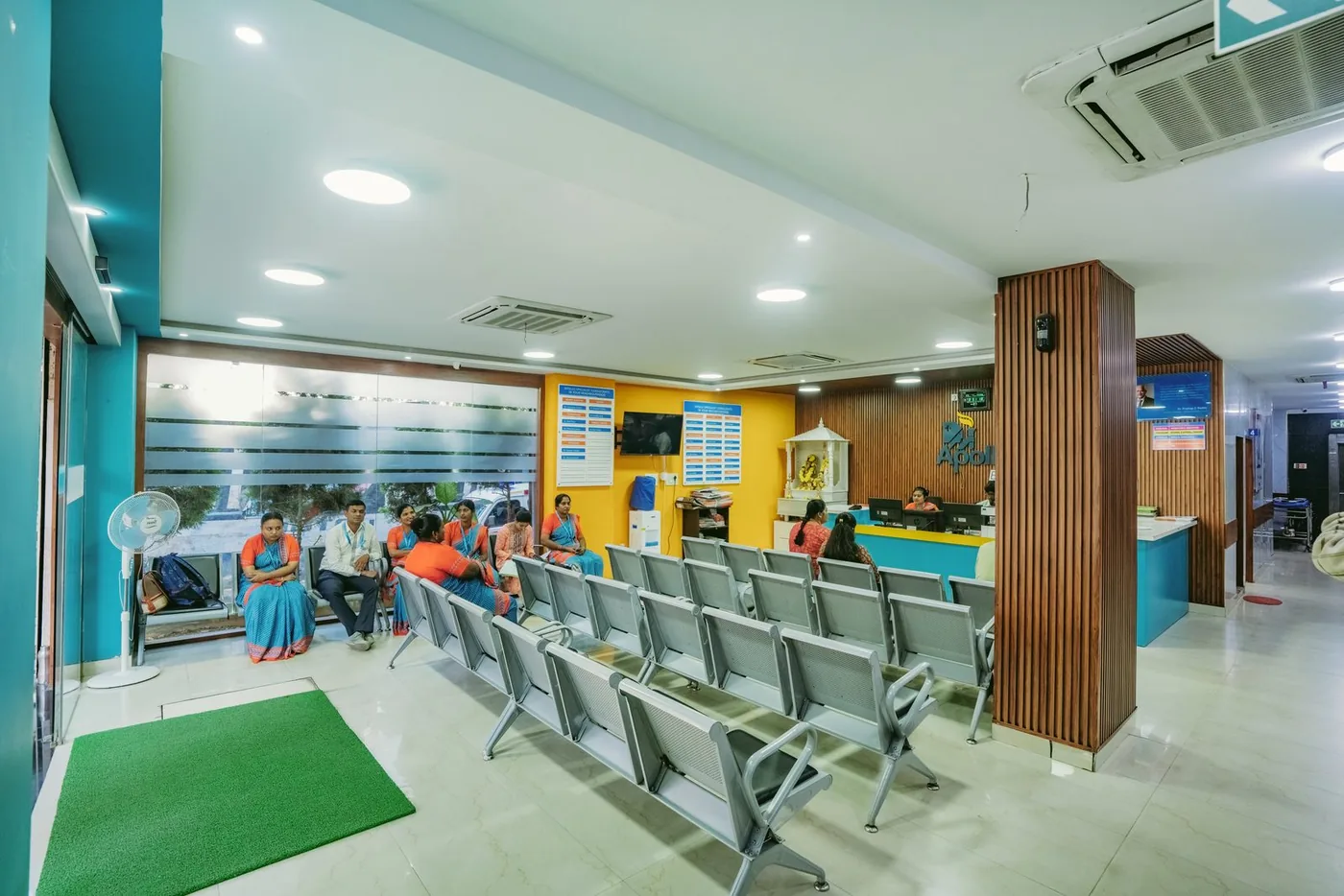 Patient Lounge — Warm materials and clear movement through a welcoming waiting space.