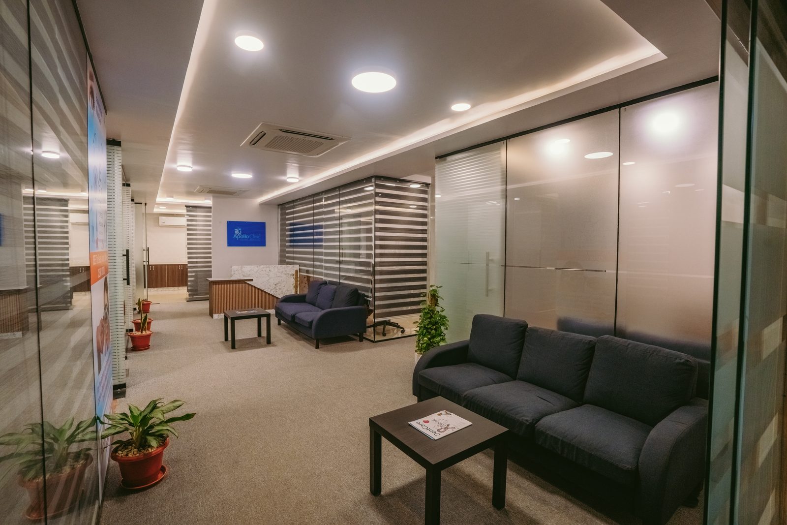 Lounge with glass partitions and seating