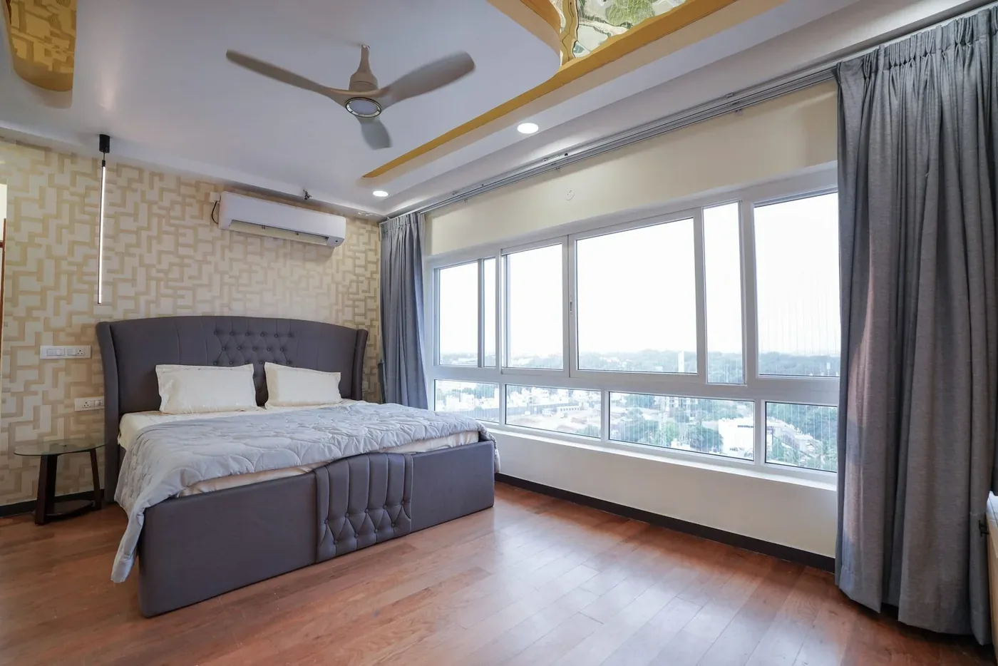 Premium RMZ master bedroom interior by Candidscape