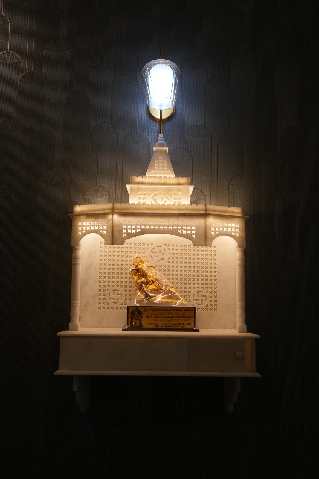 Backlit marble pooja unit