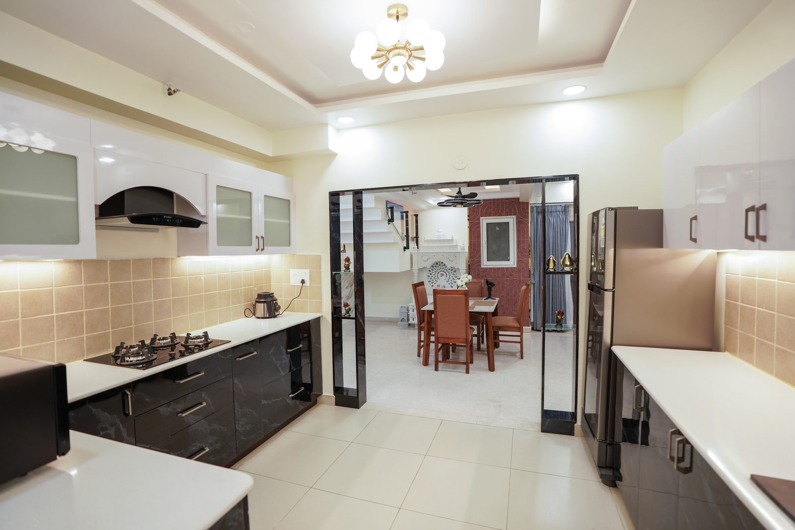 Kitchen opening onto dining beyond