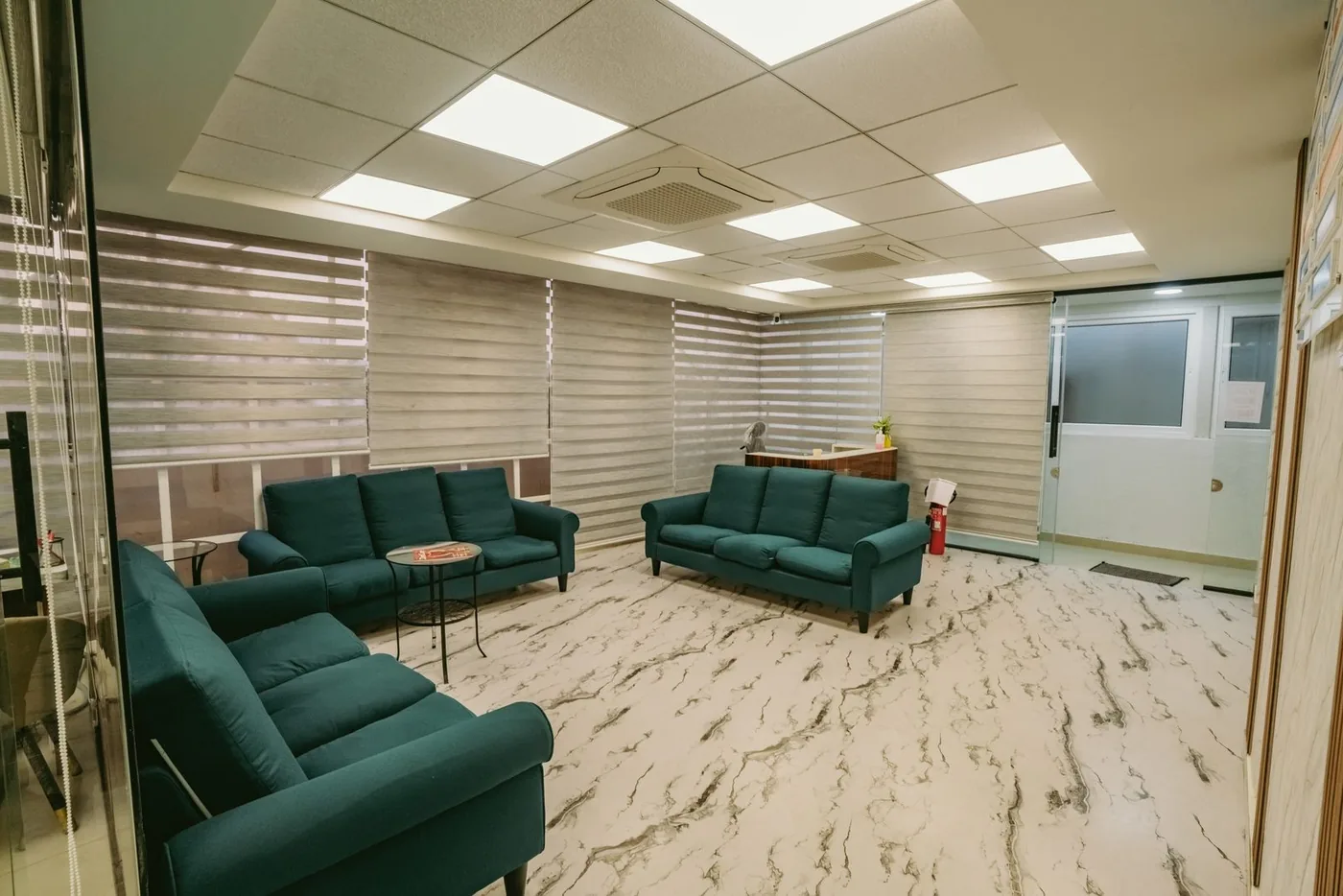 Apollo Akshaya Nagar Waiting Lounge — Deep seating and even light for an easy wait.